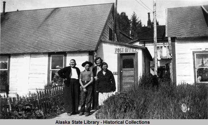Seldovia_Alaska__Minnie_Jones_Fanny_Hayes_Jackie_Mihill_and_Goldie_standing_outside_Post_Office_Building
